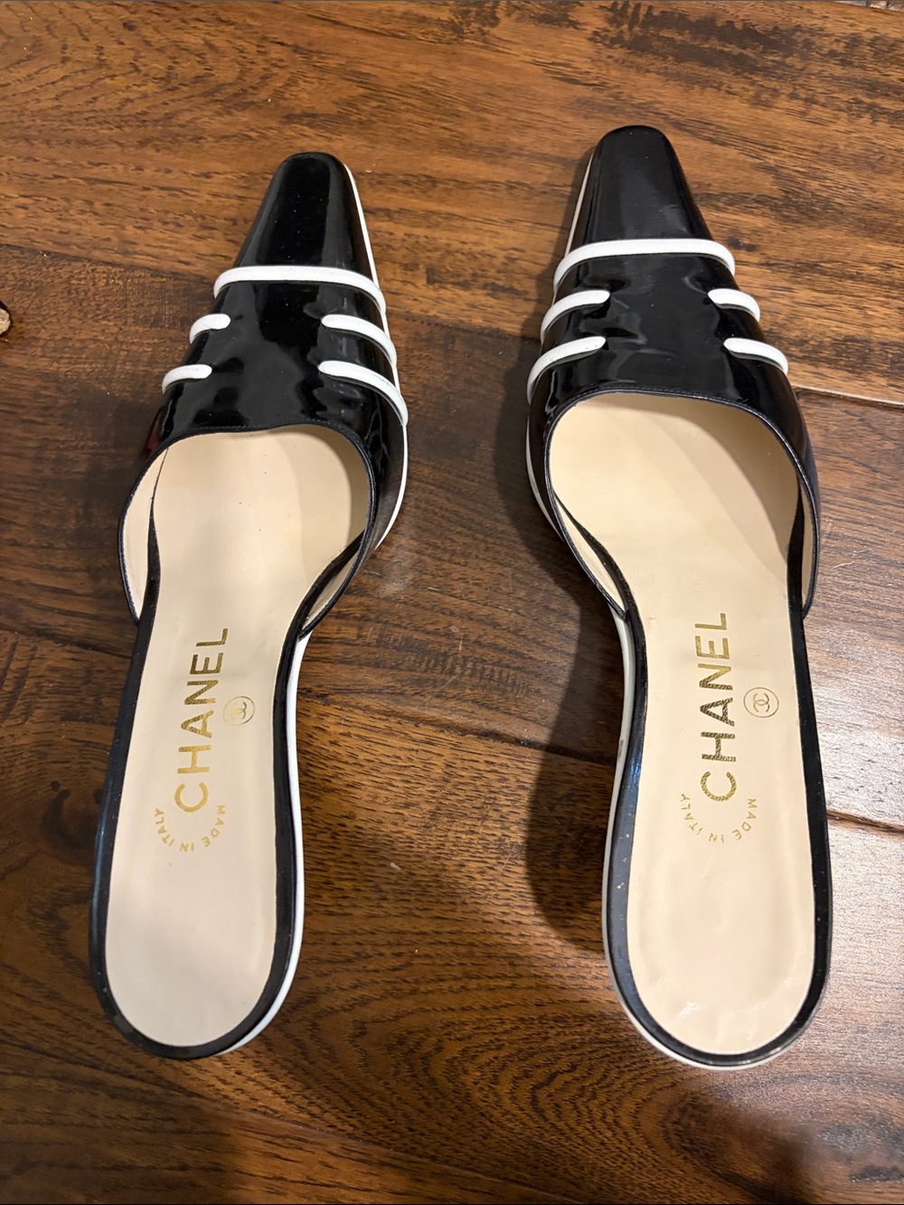 CHANEL Black Patent Leather Slide Mules with White Trim